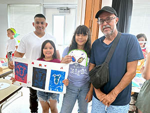 A family at the RAM art fair